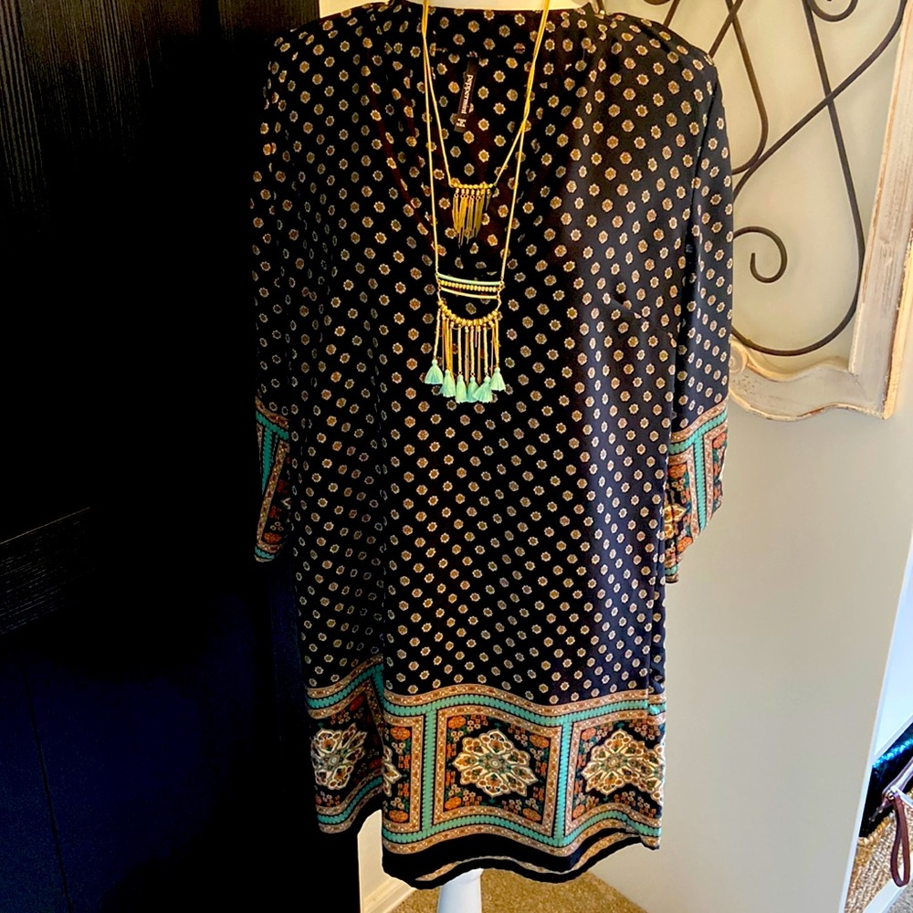 Cute little slip dress… Perfect with black, cowboy boots for the fall